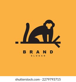 Creative monkey on tree branch logo design