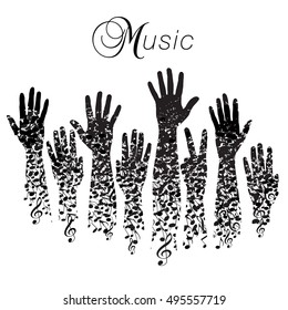 A creative musical background made with hands and notes