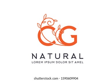 Creative orange floral wedding initial CG icon design. Vector logo template