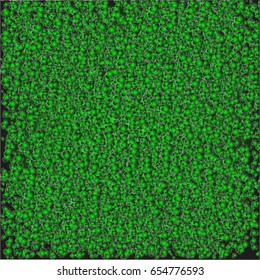 Creative ornament from green hearts of different sizes on a gradient black-green background