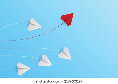 Creative paper planes on blue background. Think differently concept. Red airplane changing direction. New idea, change, trend, courage, creative solution, innovation and unique concept.