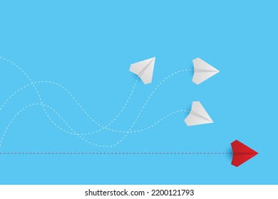 Creative paper planes on blue background. Think differently concept. Red airplane changing direction. New idea, change, trend, courage, creative solution, innovation and unique concept.