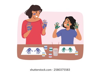 Creative pastime of mother and daughter, drawing pictures with palms, of enjoying joint hobby. Woman teacher and teenage girl are passionate about creative activity and creating masterpiece or artwork