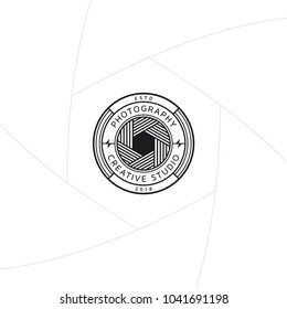 Creative photography studio badge or label design, Logo for studio and photographer or videographer with lens of camera symbol. Photography logo template