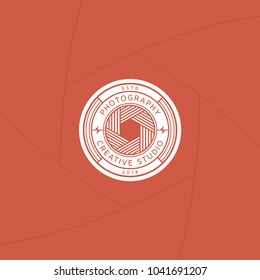 Creative photography studio badge or label design, Logo for studio and photographer or videographer with lens of camera symbol. Photography logo template