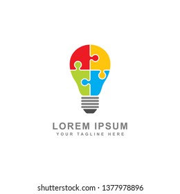Creative puzzle light bulb concept isolated white background
