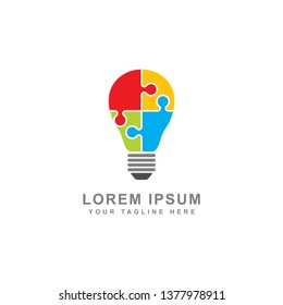 Creative puzzle light bulb concept isolated white background