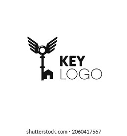 Logo inmobiliario creativo con llave, alas y casa.