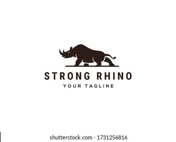 creative rhino logo design, standing rhinoceros in vintage style