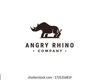 creative rhino logo design, standing rhinoceros in vintage style