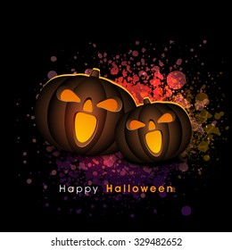 Creative scary Jack-o-Lanterns on colorful splash background for Happy Halloween Party celebration.