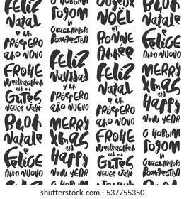 Creative seamless pattern with Christmas greetings in different European languages. Black handdrawn lettering Merry Christmas and Happy New Year on white. Modern ink calligraphy. For packaging paper