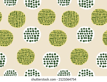 Creative seamless pattern with hand drawntextures. Abstract  beige background. Polka dot pattern.Abstract geometric seamless pattern with circles and gree glitter elements. Trendy hand drawn textures.