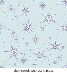 Creative seamless pattern of creative snowflakes on a blue background. New Year's festive theme. Vector design for winter decor, print, wallpaper, decorations, packaging, textiles, covers