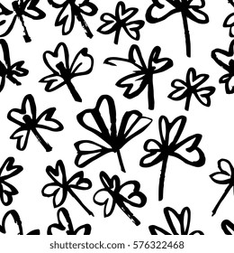 Creative seamless pattern with St. Patrick's day leaves. Textures made with ink. Hand-drawn for your designs: posters, invitations, cards, etc. Vector.