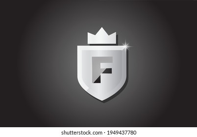 Creative shield F alphabet letter logo icon in grey color. Corporate business design for company template identity with king crown and light spark