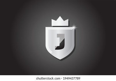 Creative shield J alphabet letter logo icon in grey color. Corporate business design for company template identity with king crown and light spark