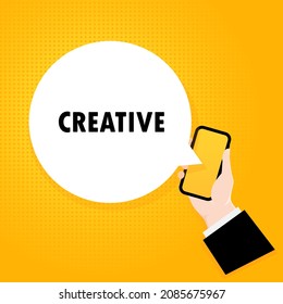 Creative. Smartphone with a bubble text. Poster with text Creative. Comic retro style. Phone app speech bubble. Vector EPS 10. Isolated on background.