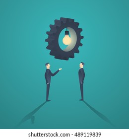 Creative solution business concept with two businessman and gear with lightbulb. Eps10 vector illustration.