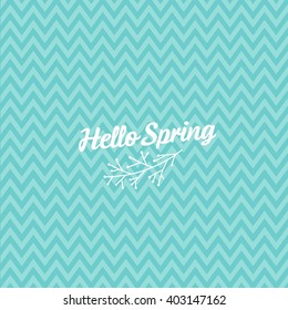 Creative spring typography with branches on blue chevron background 