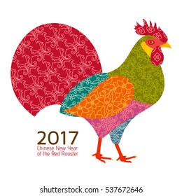 Creative stylized rooster in patchwork style. 2017 New Year symbol red cock. Vector illustration
