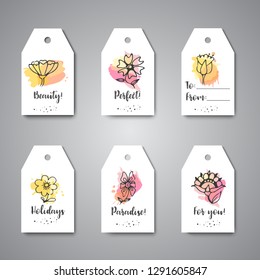 Creative tags with flowers. Hand drawn floral elements. Vector template labels, hanging, gift cards for presents, wedding, invitation