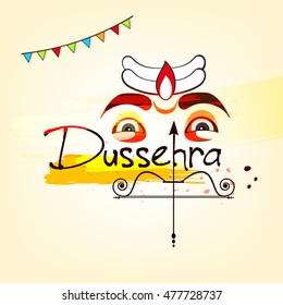 Creative text based Design with Ravana eyes, Bow & Arrow on Grungy colorful decorative background on the occassion of Happy Dussehra. 