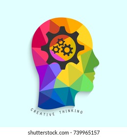 Creative thinking concept with gears and colorful head silhouette made in low poly design