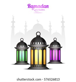 Creative traditional lanterns on mosque silhouetted background for Islamic Holy Month of Fasting, Ramadan Kareem celebration.