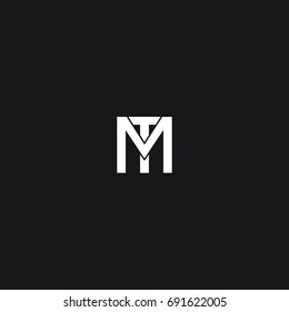 Creative unique elegant geometric squared shaped minimal business brand black and white color MT TM M T  initial based letter icon logo.