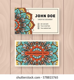 Creative useful business name card design. Vintage colored Mandala design for personal name card, visiting card or tag. Round ornament vector illustration.