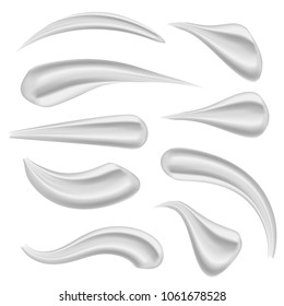 Creative vector illustration of various strokes beauty face cosmetic white cream texture set isolated on transparent background. Art design gel or foam drop. Abstract concept graphic element.