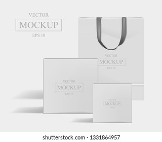 Creative white mockup. Shopping bag and 2 boxes. Vector illustration