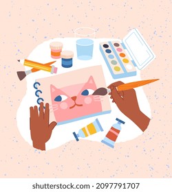 Creative workshop concept. Relaxing entertainment. Hand hold brush and paint cat on piece of paper. Watercolor or acrylic. Pleasant pastime for children and adults. Cartoon flat vector illustration