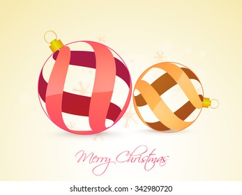 Creative Xmas Balls on snowflakes decorated glossy background for Merry Christmas celebration.