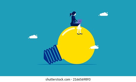 Creativity in problem solving. A smart business woman sitting on a light bulb