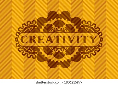 Creativity text inside orange emblem. Geometric graceful background. Artistic illustration. 