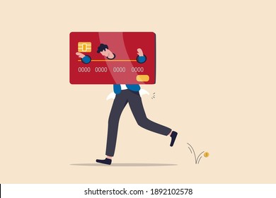 Credit card debt, overspending problem, financial failure or too much cost and expense concept, broke hopeless salary office worker shackled fetters with big credit card with his empty pant pocket.