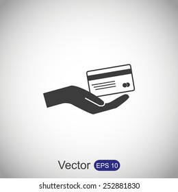 Credit card and hand 