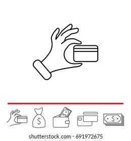 Credit card in hand icon