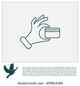 Credit card in hand icon
