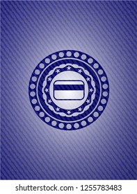 credit card icon inside badge with denim texture