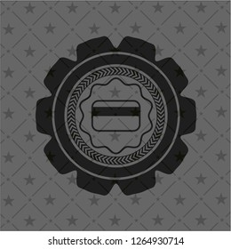 credit card icon inside black emblem