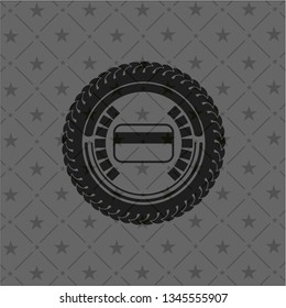 credit card icon inside dark emblem