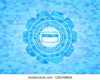 credit card icon inside light blue emblem with triangle mosaic background