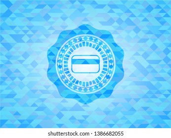 credit card icon inside light blue mosaic emblem
