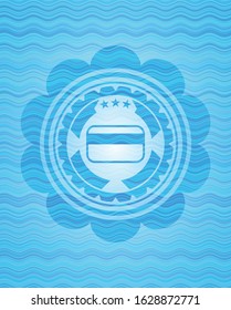 credit card icon inside light blue water wave badge background.