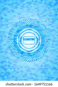 credit card icon inside light blue emblem with triangle mosaic background