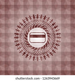 credit card icon inside red seamless emblem with geometric background.
