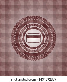 credit card icon inside red seamless emblem with geometric pattern background.